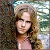 Hermione behind a tree