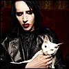 Manson holding a cat