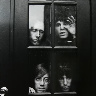 The Doors behind glass
