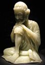 Sitting man statue